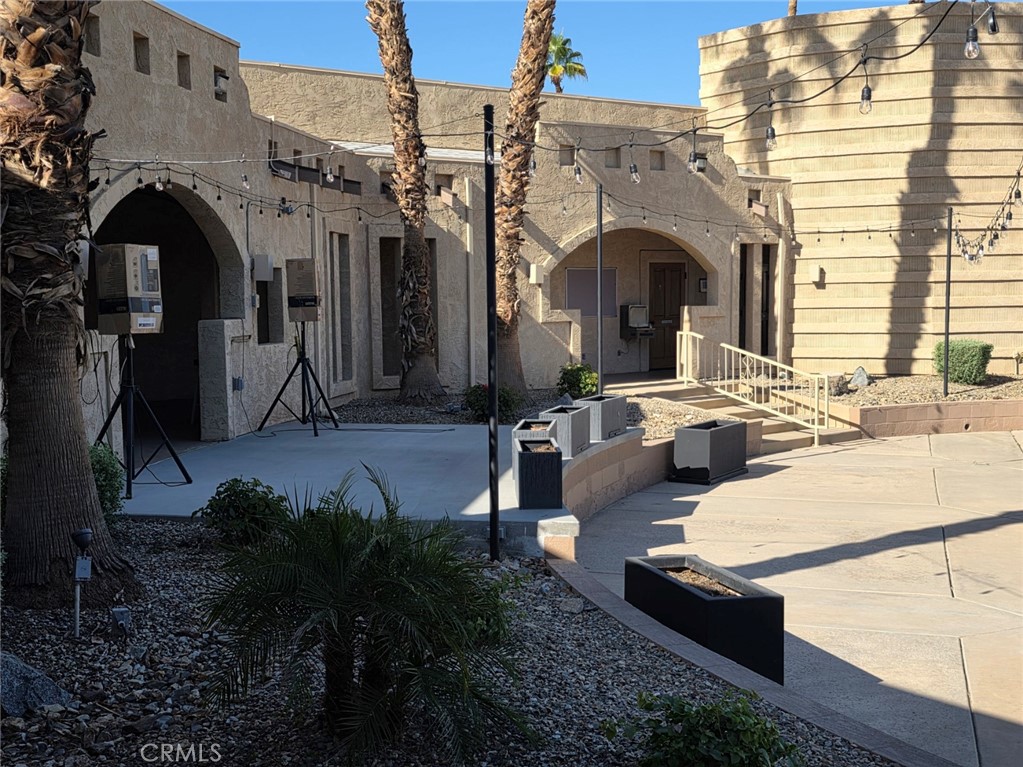 81620 Ave 49, Unit 174 Indio, CA 92201 - Photo 33 of 37 a view of building with outdoor space