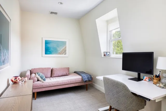 a bedroom with bed and a couch