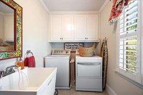 802 Pathview Court Dacula, GA 30019 - Photo 30 of 56 a utility room with dryer washer and a window