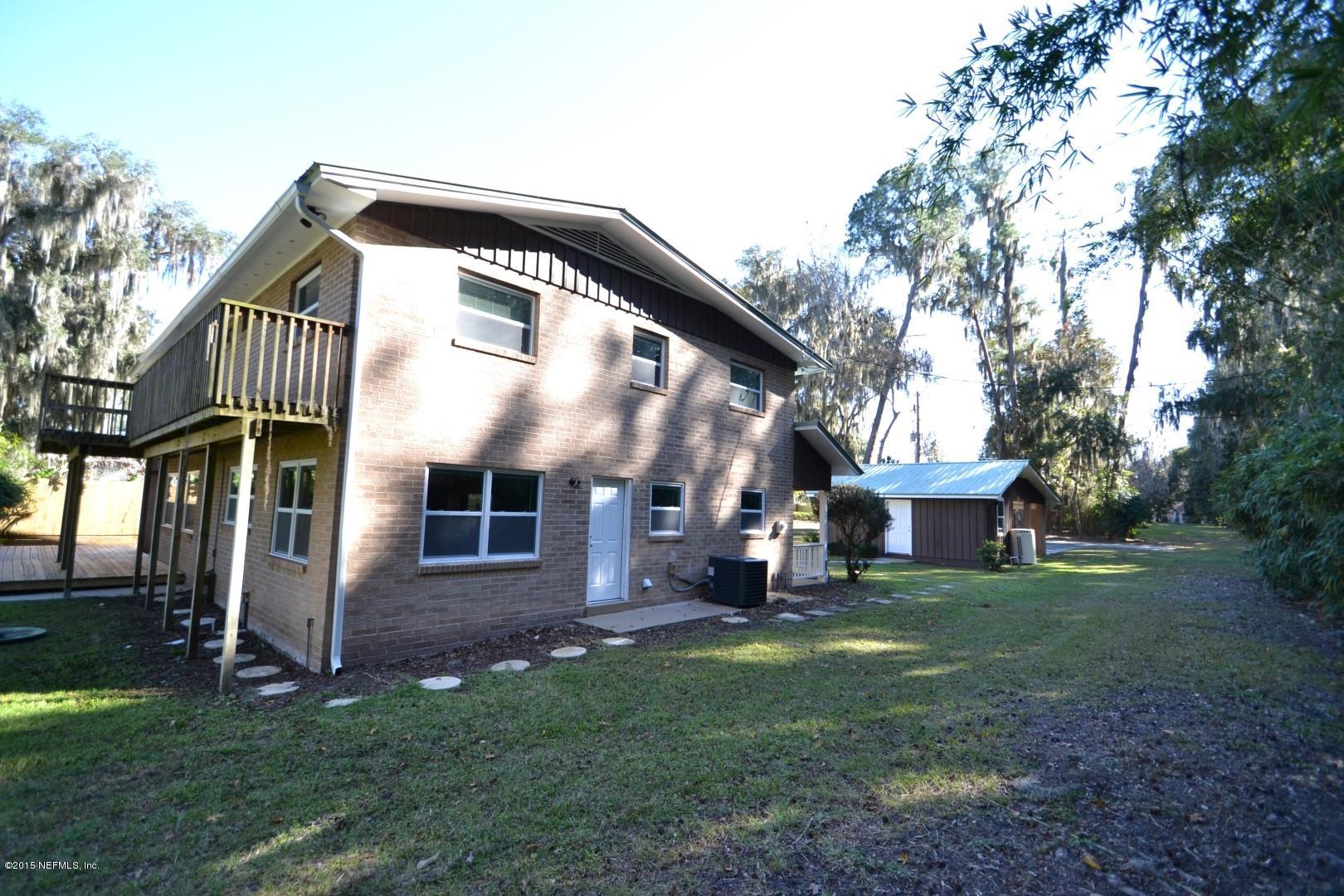 76 Harmony Hall Road Middleburg, FL 32068 - Photo 11 of 67 a view of a house with backyard