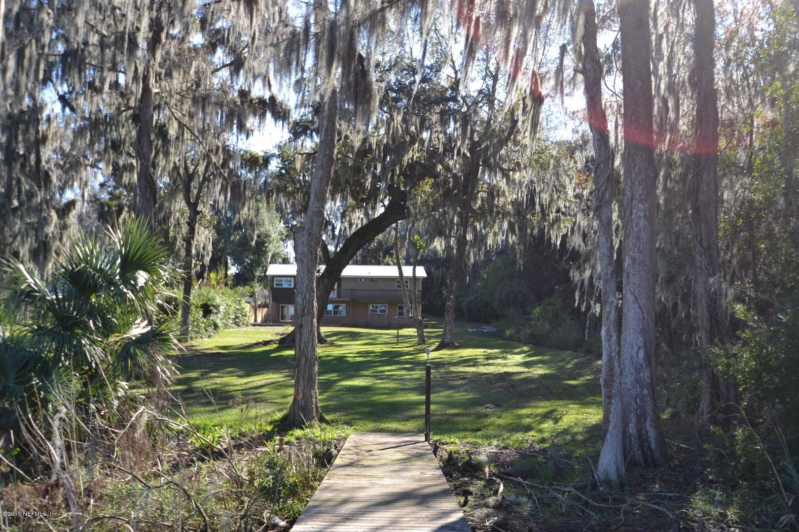 76 Harmony Hall Road Middleburg, FL 32068 - Photo 21 of 67 a view of a garden with a tree