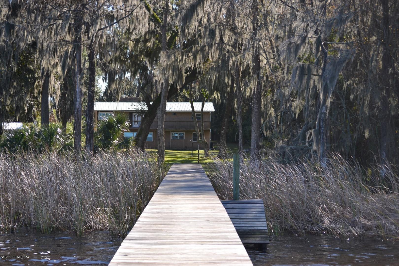 76 Harmony Hall Road Middleburg, FL 32068 - Photo 23 of 67 a view of a pathway with a wrought fence