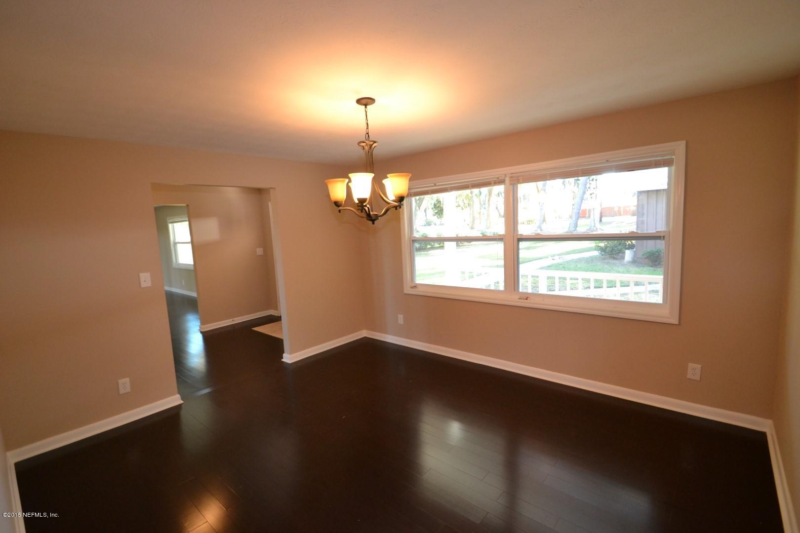 76 Harmony Hall Road Middleburg, FL 32068 - Photo 42 of 67 wooden floor in an empty room with a window