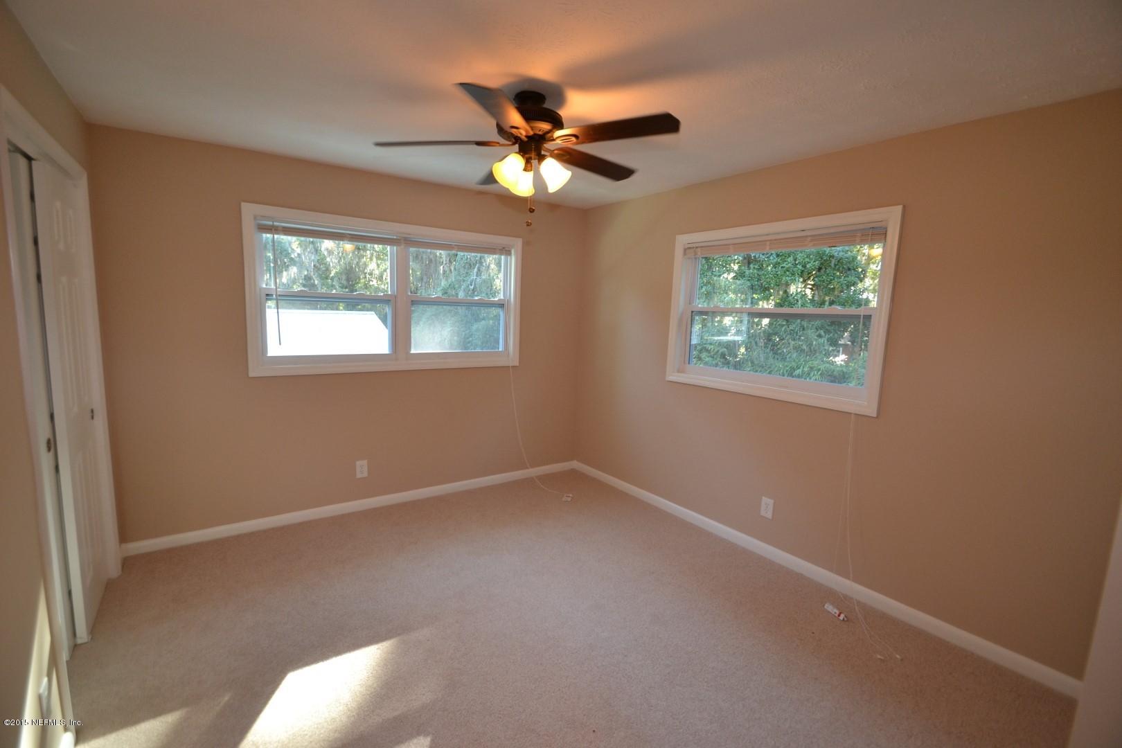 76 Harmony Hall Road Middleburg, FL 32068 - Photo 54 of 67 a view of an empty room with a window