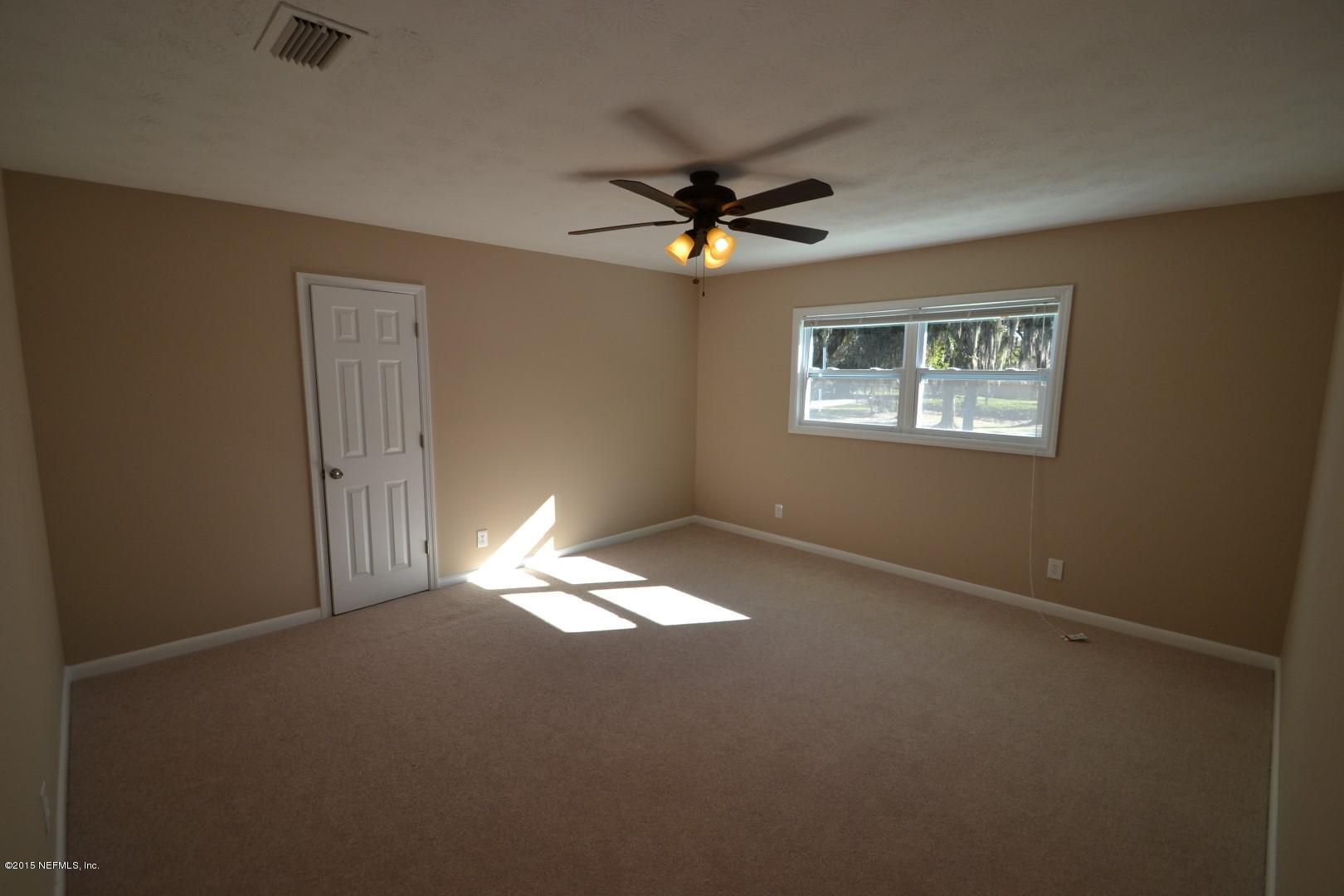 76 Harmony Hall Road Middleburg, FL 32068 - Photo 57 of 67 a view of empty room with windows