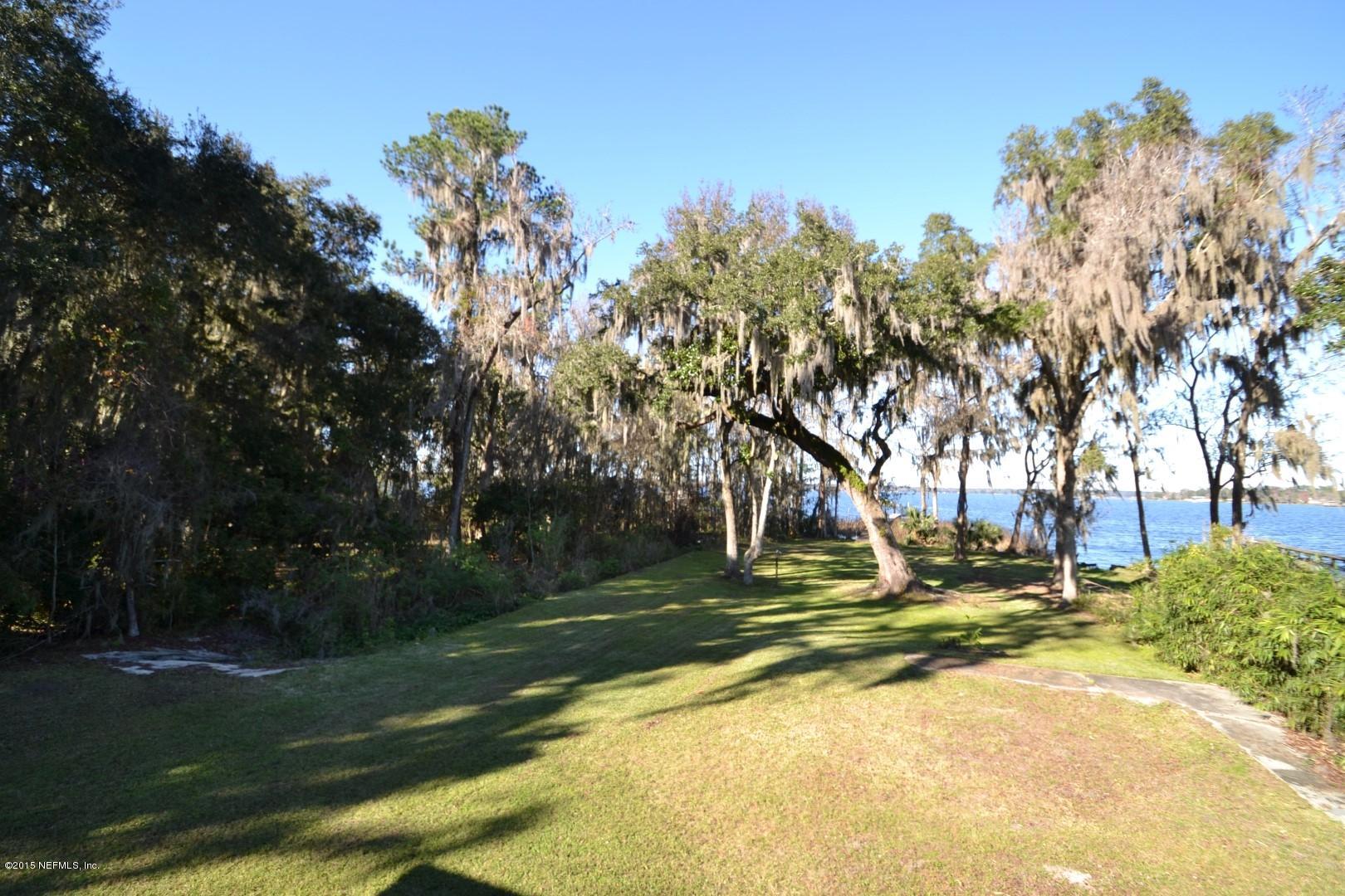 76 Harmony Hall Road Middleburg, FL 32068 - Photo 62 of 67 a view of a playground with basketball court
