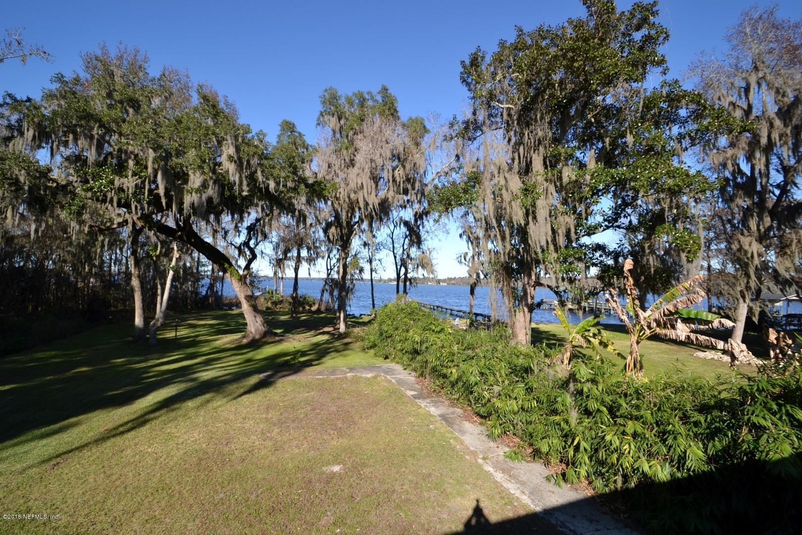 76 Harmony Hall Road Middleburg, FL 32068 - Photo 63 of 67 a view of a park with large trees