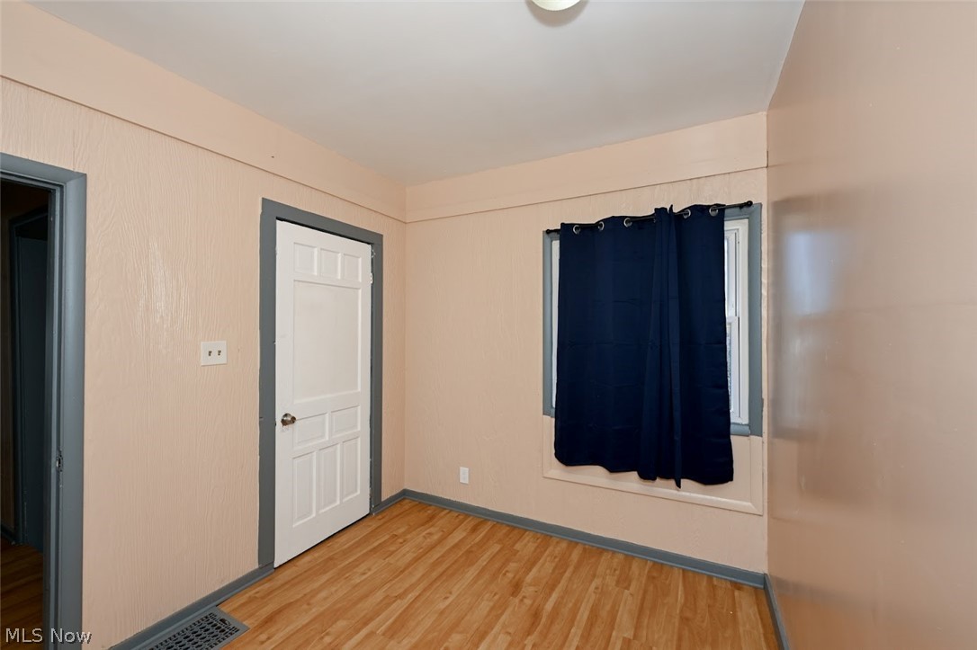 868 North Main Street Akron, OH 44310 - Photo 24 of 30 Unfurnished bedroom with light wood finished floors and baseboards