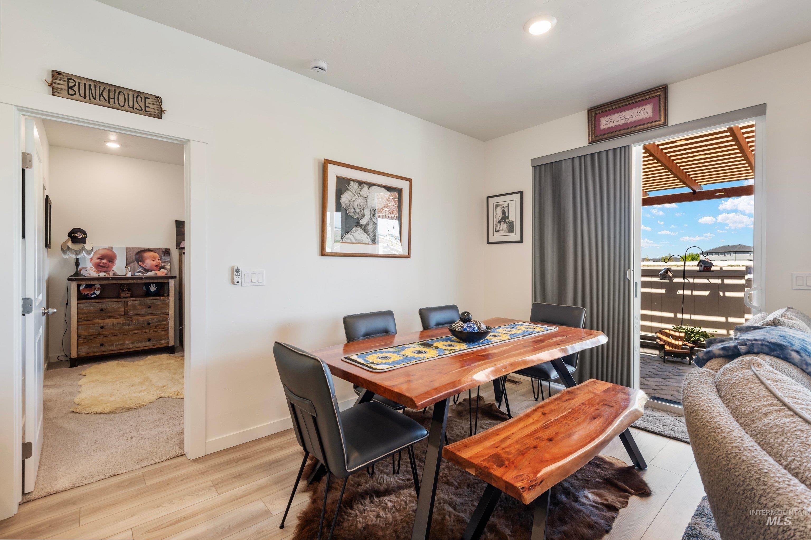4232 South Graycliff Way Meridian, ID 83642 - Photo 12 of 34 Dining area featuring wood-finish flooring and recessed lighting
