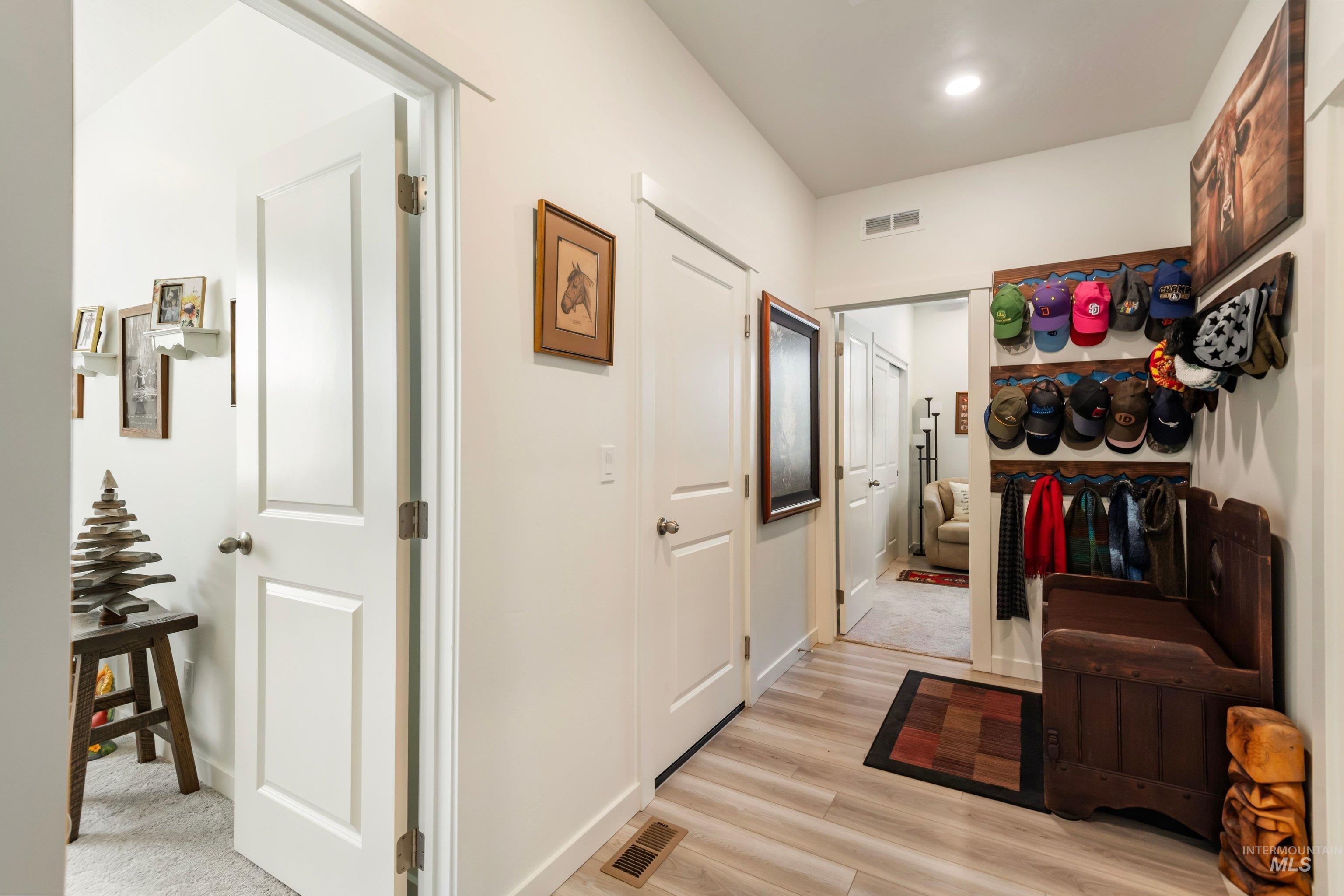4232 South Graycliff Way Meridian, ID 83642 - Photo 19 of 34 Entryway featuring light wood-finish flooring and neutral wall tones