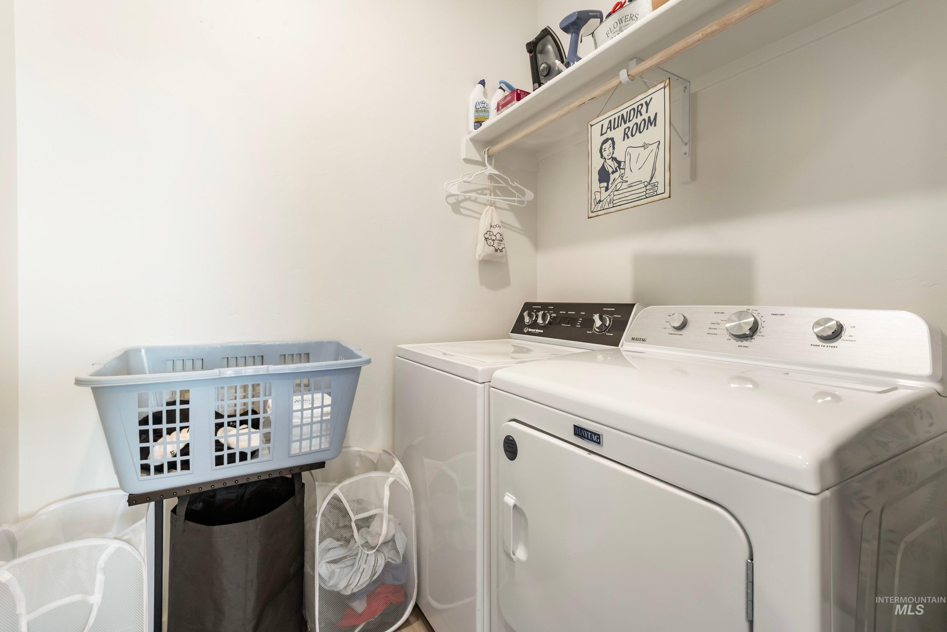 4232 South Graycliff Way Meridian, ID 83642 - Photo 23 of 34 Dedicated laundry area featuring white walls and a built-in shelving unit