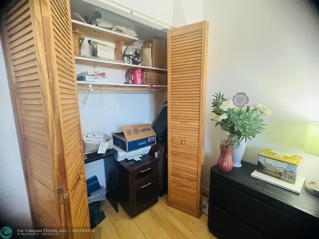 a view of workspace with wooden floor