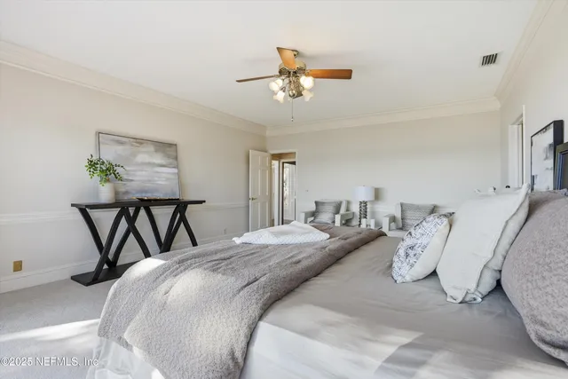 a bathroom with a granite countertop sink a large mirror and a bathtub