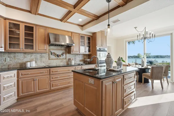a bathroom with a sink mirror and toilet