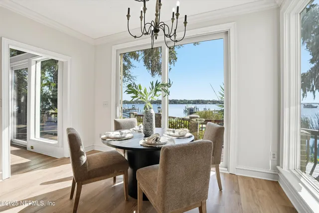 a kitchen with stainless steel appliances a refrigerator sink and cabinets