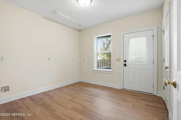 a view of balcony with deck and outdoor space