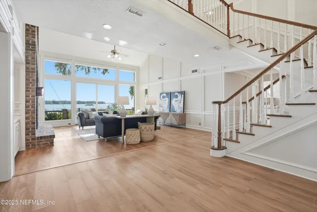 a view of entryway with wooden floor