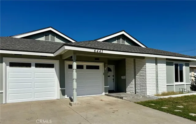 a view of a house with garage