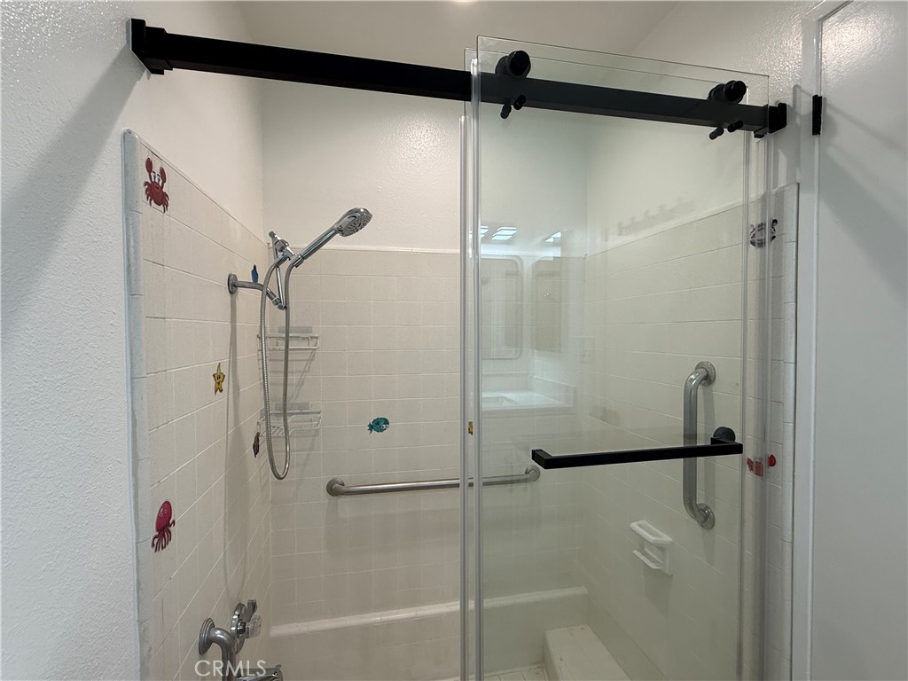6441 St Paul Circle, Unit A Huntington Beach, CA 92647 - Photo 13 of 13 a bathroom with a shower