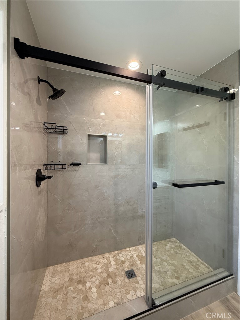 6441 St Paul Circle, Unit A Huntington Beach, CA 92647 - Photo 10 of 13 a bathroom with a shower