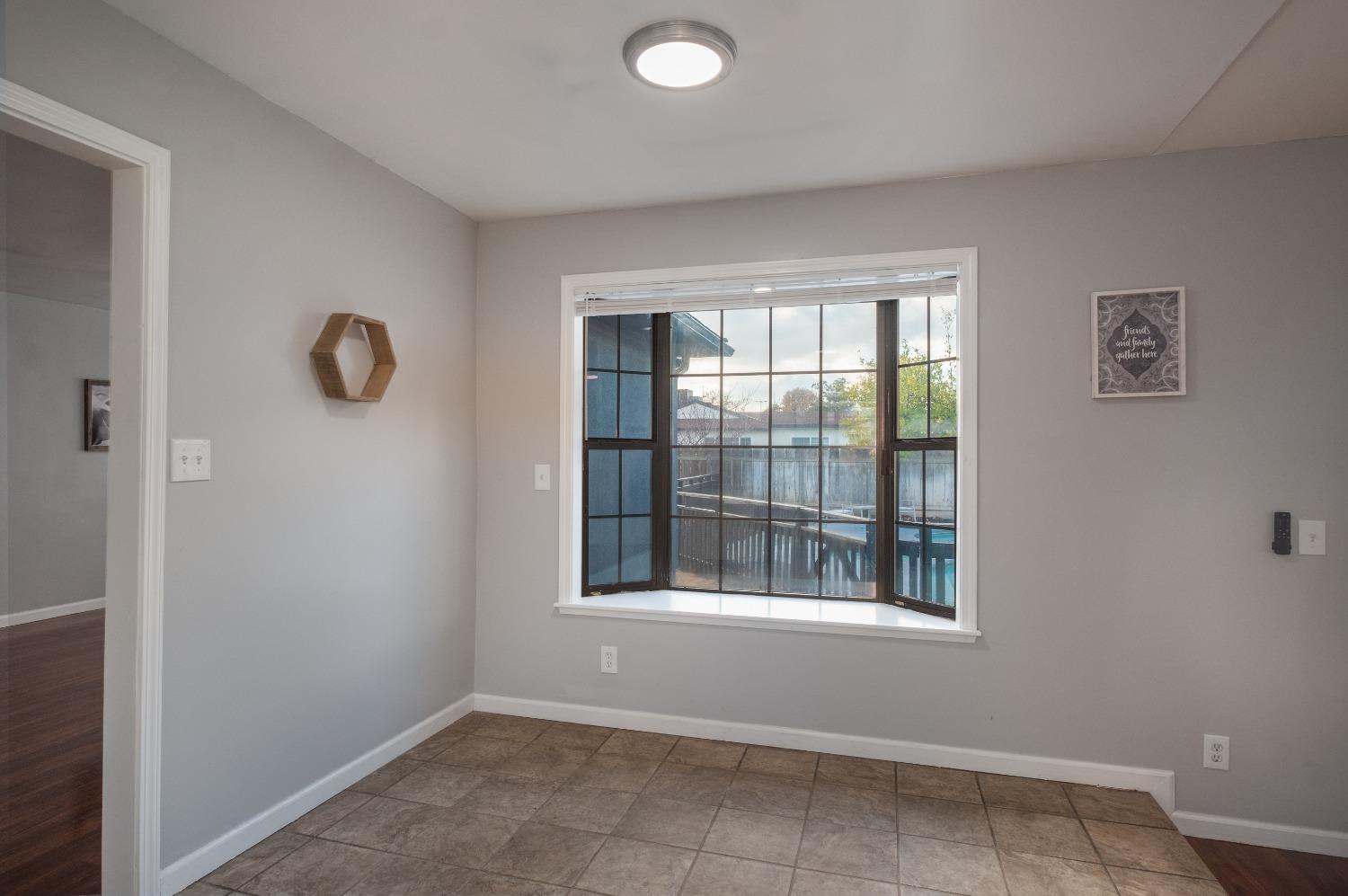 2248 Sunnyside Avenue Clovis, CA 93612 - Photo 5 of 25 a view of an empty room with a window