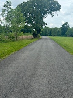 0 Beech Grove Road Lafayette, TN 37083 - Photo 4 of 7 a view of a field with trees in background