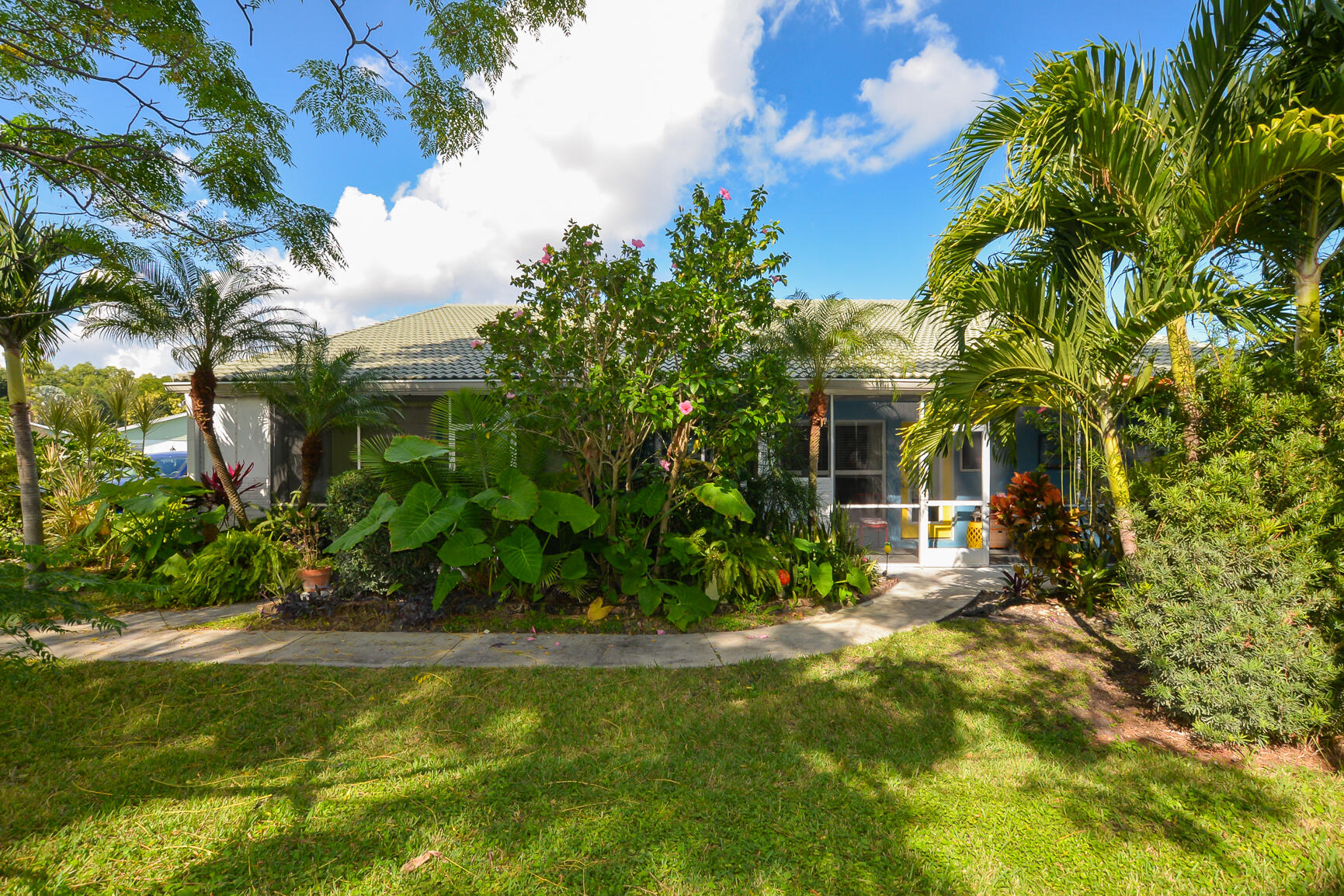 2123 Southeast Wayne Road Stuart, FL 34994 - Photo 24 of 24 a view of a house with a yard