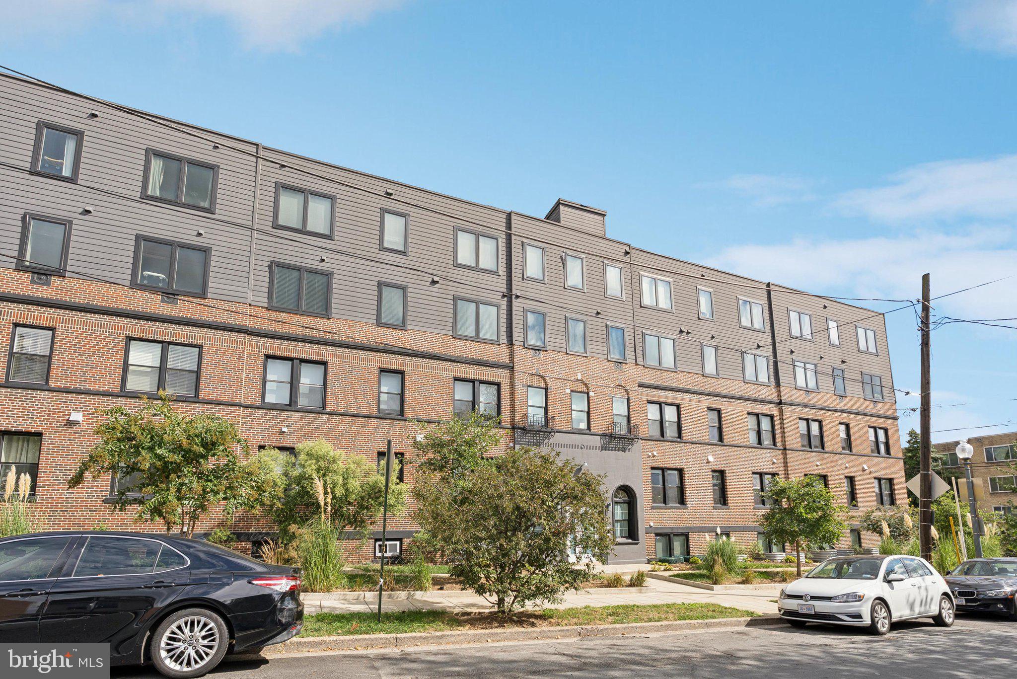 839 Kennedy Street Northwest, Unit 105 Washington, DC 20011 - Photo 19 of 21 a car parked in front of a building