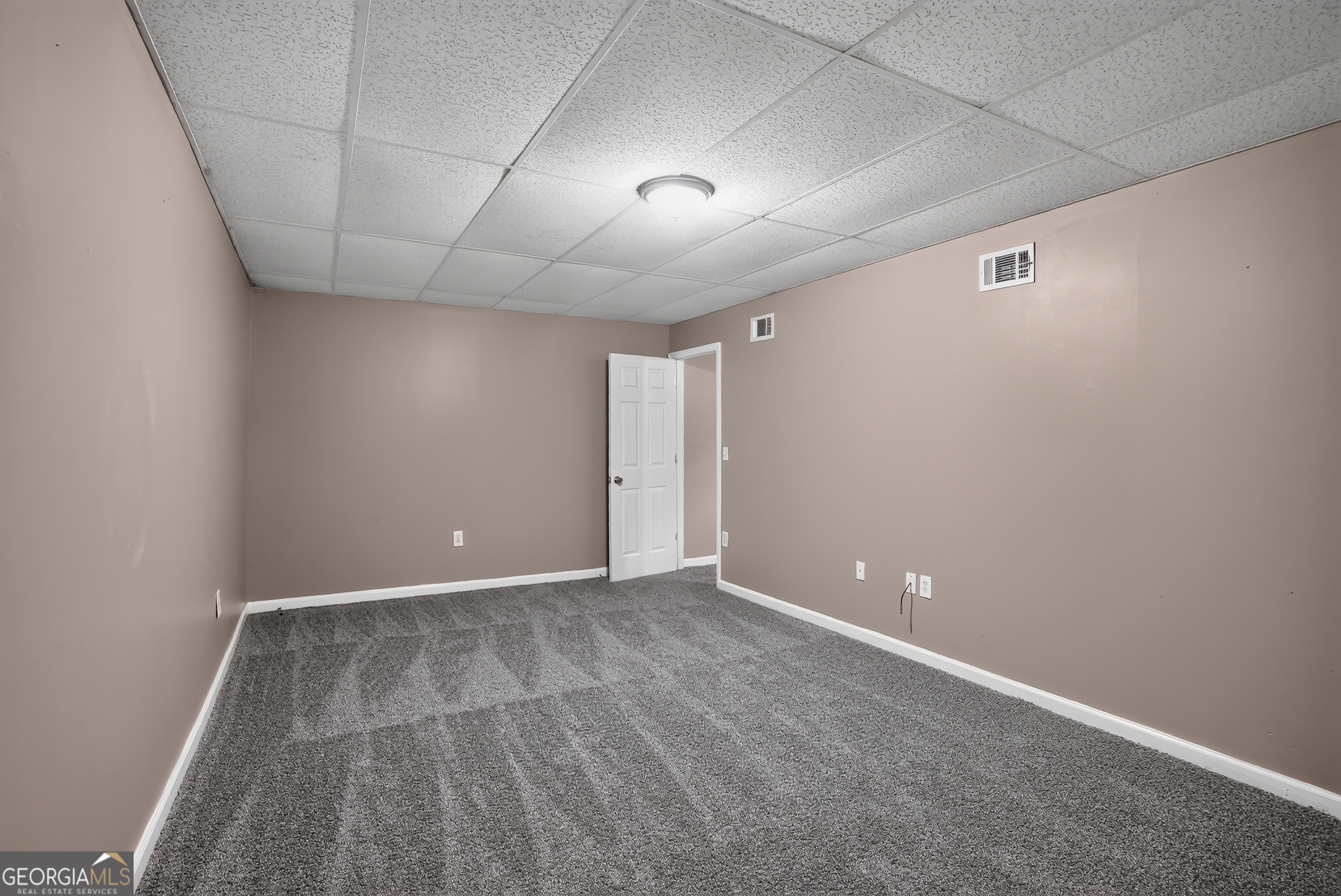 75 Linsley Way Covington, GA 30016 - Photo 47 of 48 a view of an empty room