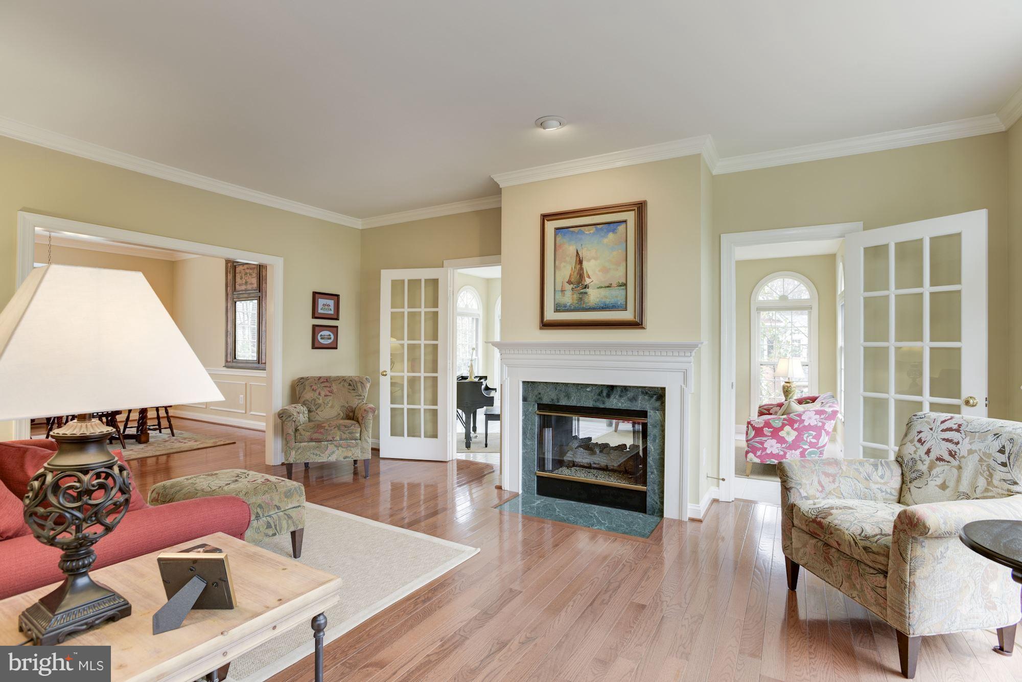 11403 Wild Bramble Way Reston, VA 20194 - Photo 3 of 27 Beautiful Formal Living Room w/ 2 Sided Fireplace