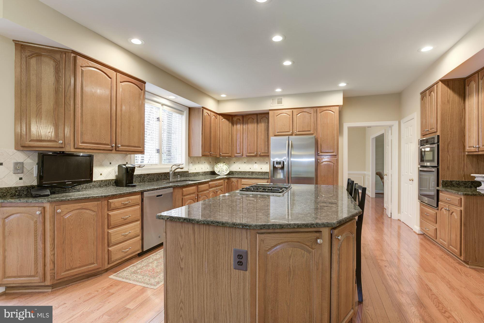 11403 Wild Bramble Way Reston, VA 20194 - Photo 22 of 27 Gourmet Kitchen w/ Granite