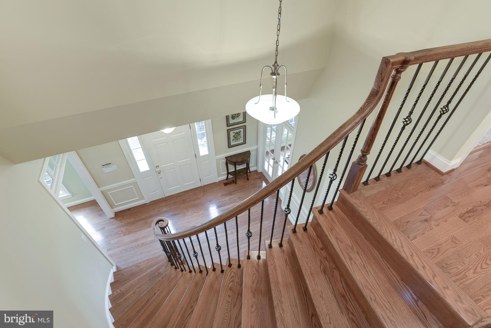 11403 Wild Bramble Way Reston, VA 20194 - Photo 8 of 27 Elegant Curved Staircase