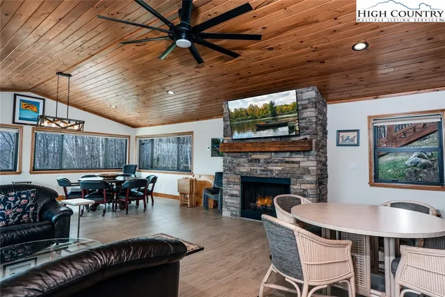 a dining room with furniture window and outside view
