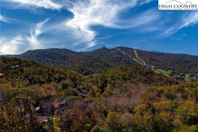 a view of a house with a mountain