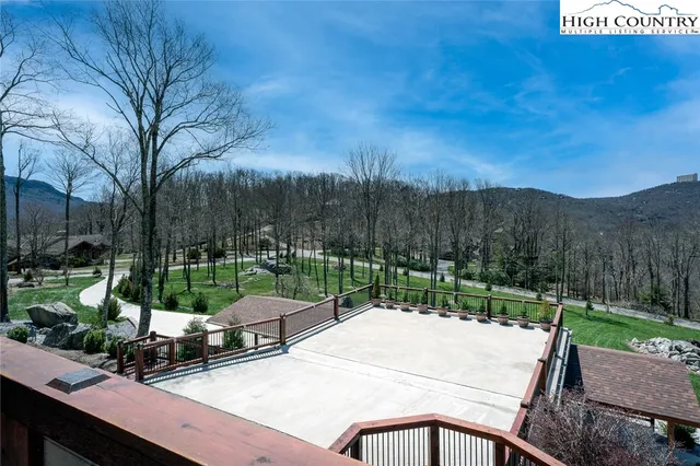 a view of balcony with furniture