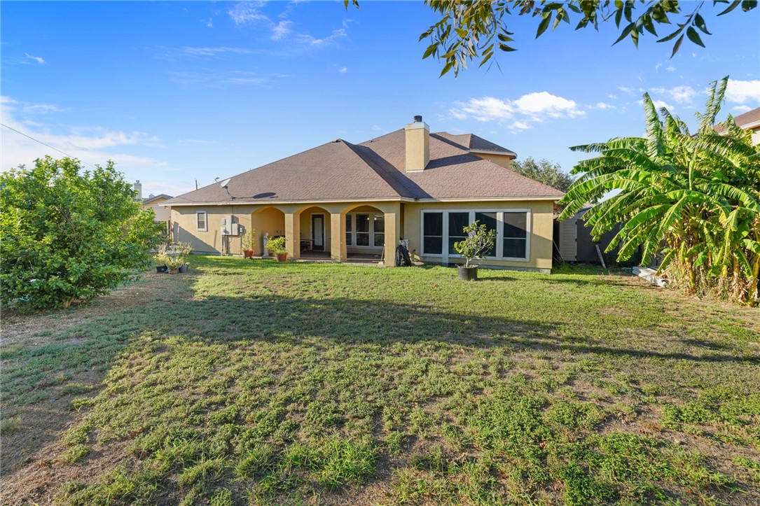 8226 Azimuth Court Corpus Christi, TX 78414 - Photo 27 of 32 a front view of a house with a yard