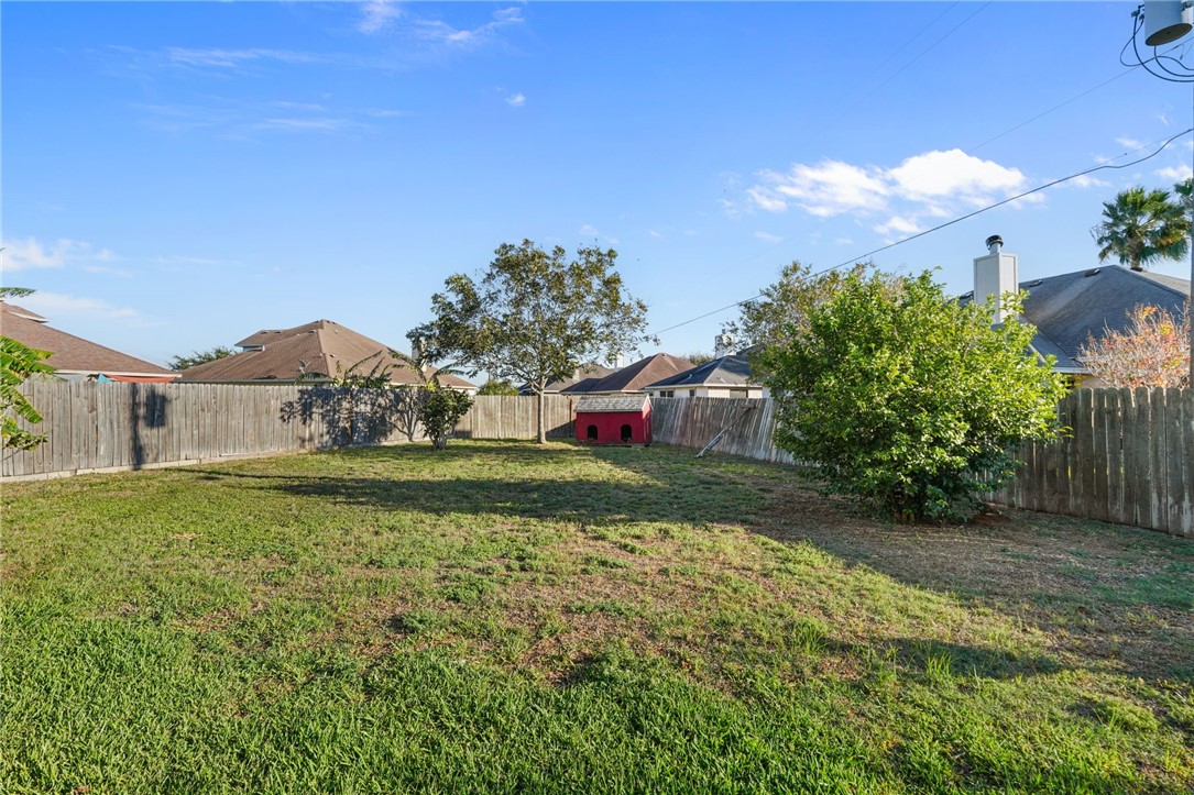 8226 Azimuth Court Corpus Christi, TX 78414 - Photo 28 of 32 a view of a large garden with plants and large trees