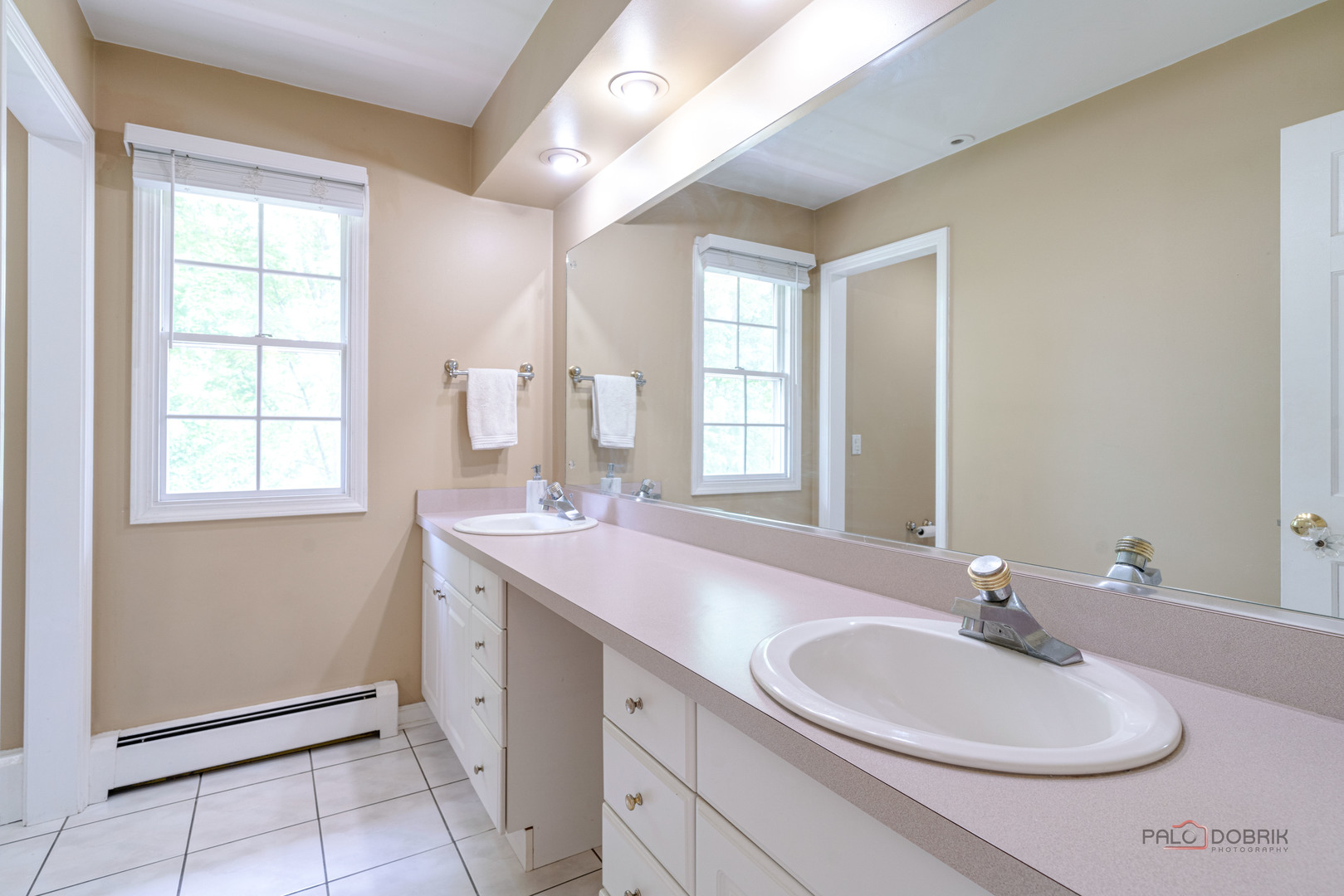 357 Roberts Road Inverness, IL 60010 - Photo 31 of 50 a bathroom with a sink double vanity and a tub
