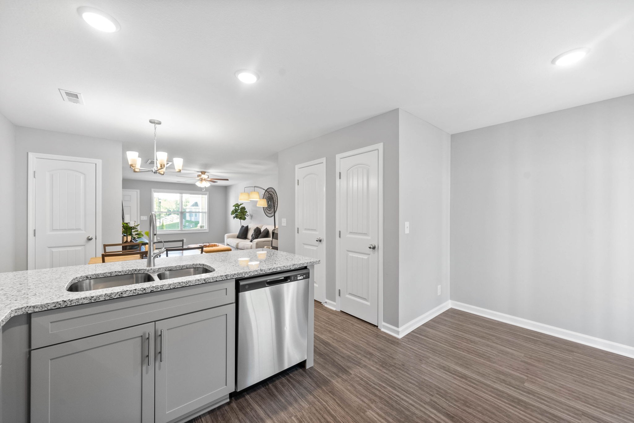 102 Davis Ridge Lane Clarksville, TN 37040 - Photo 13 of 27 a kitchen with a sink cabinets and wooden floor