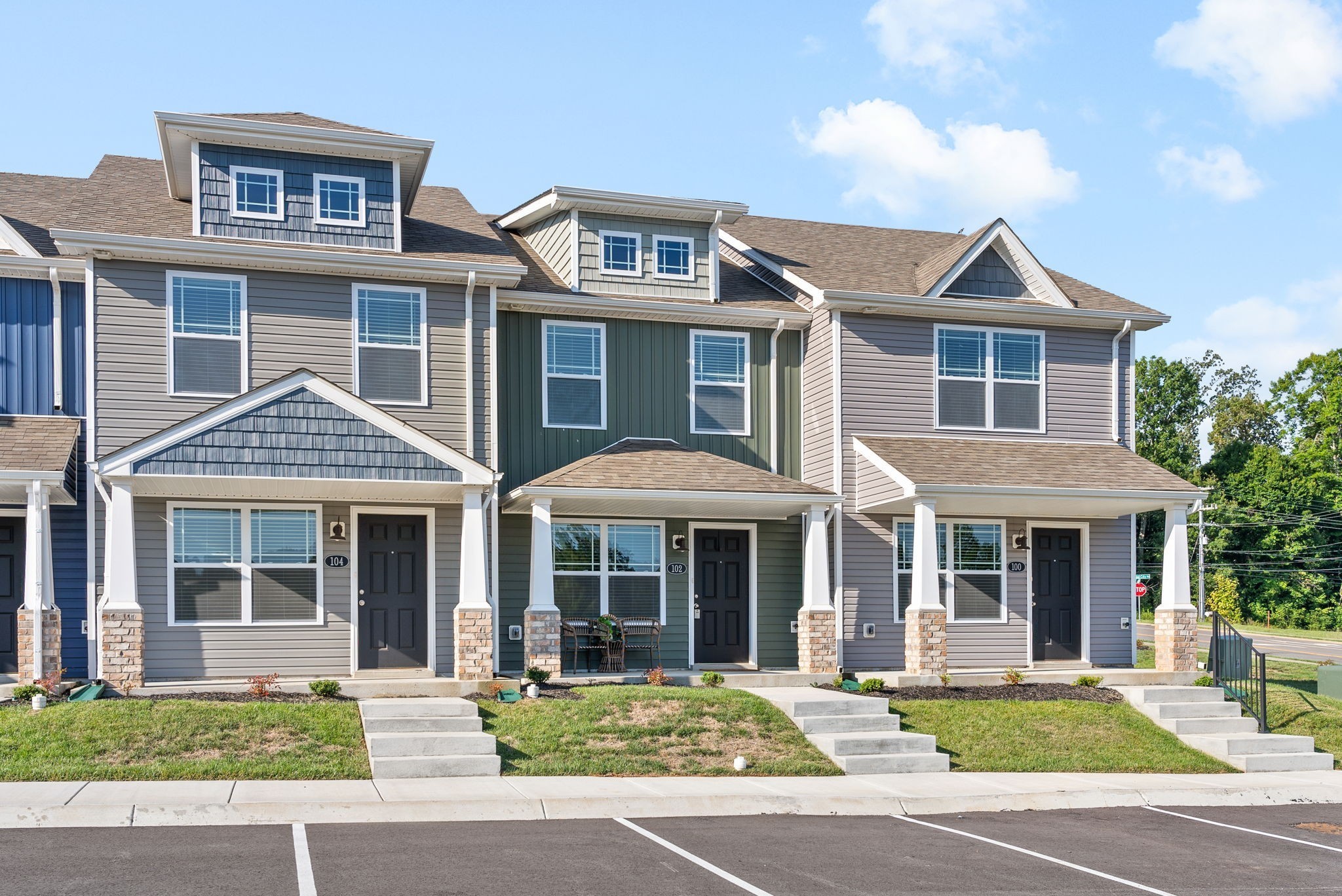 102 Davis Ridge Lane Clarksville, TN 37040 - Photo 2 of 27 a front view of a residential apartment building with a yard