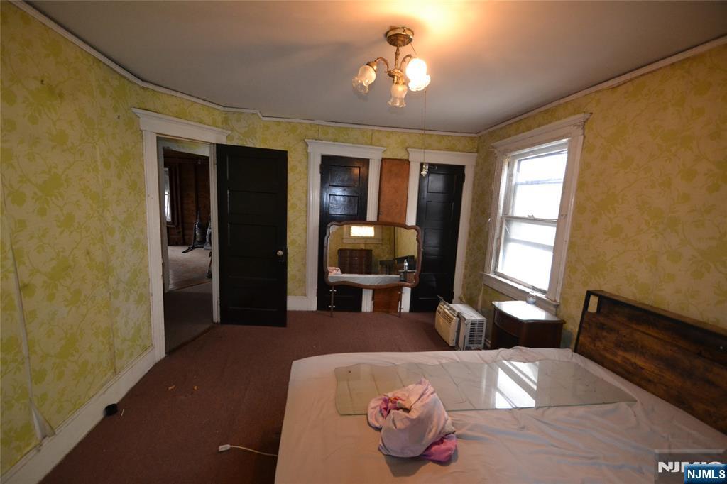 86 Montross Avenue Rutherford, NJ 07070 - Photo 12 of 23 a living room with furniture and window
