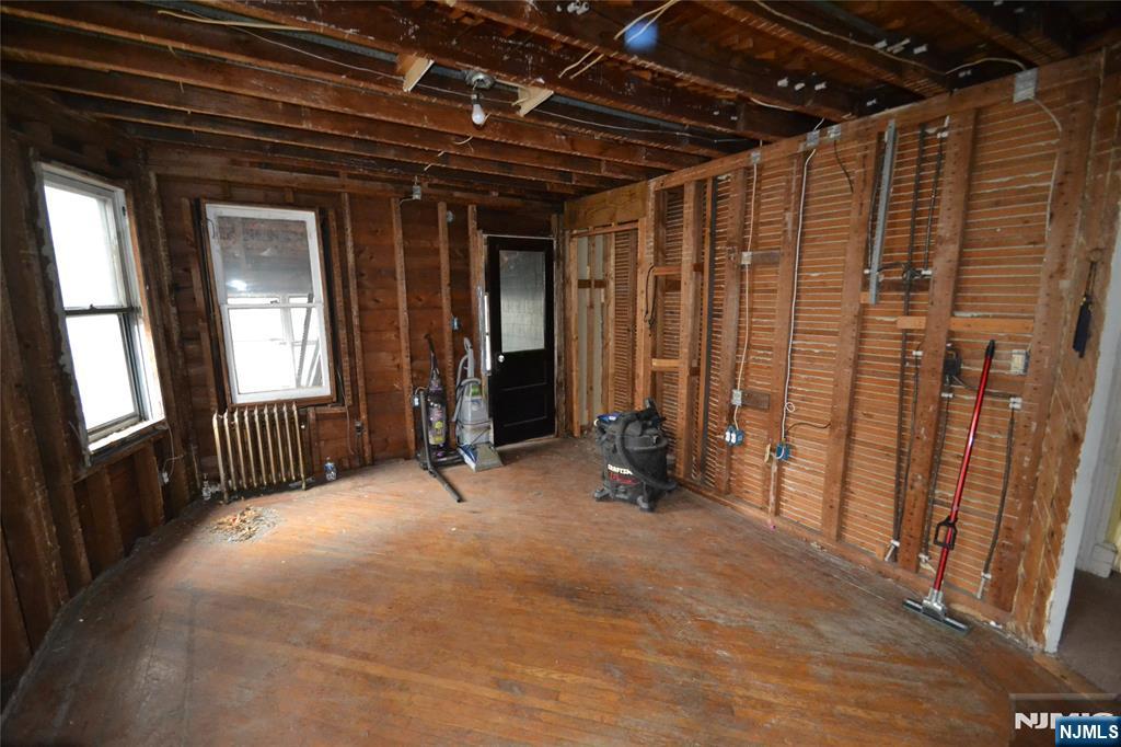 86 Montross Avenue Rutherford, NJ 07070 - Photo 17 of 23 a view of a hallway with wooden walls