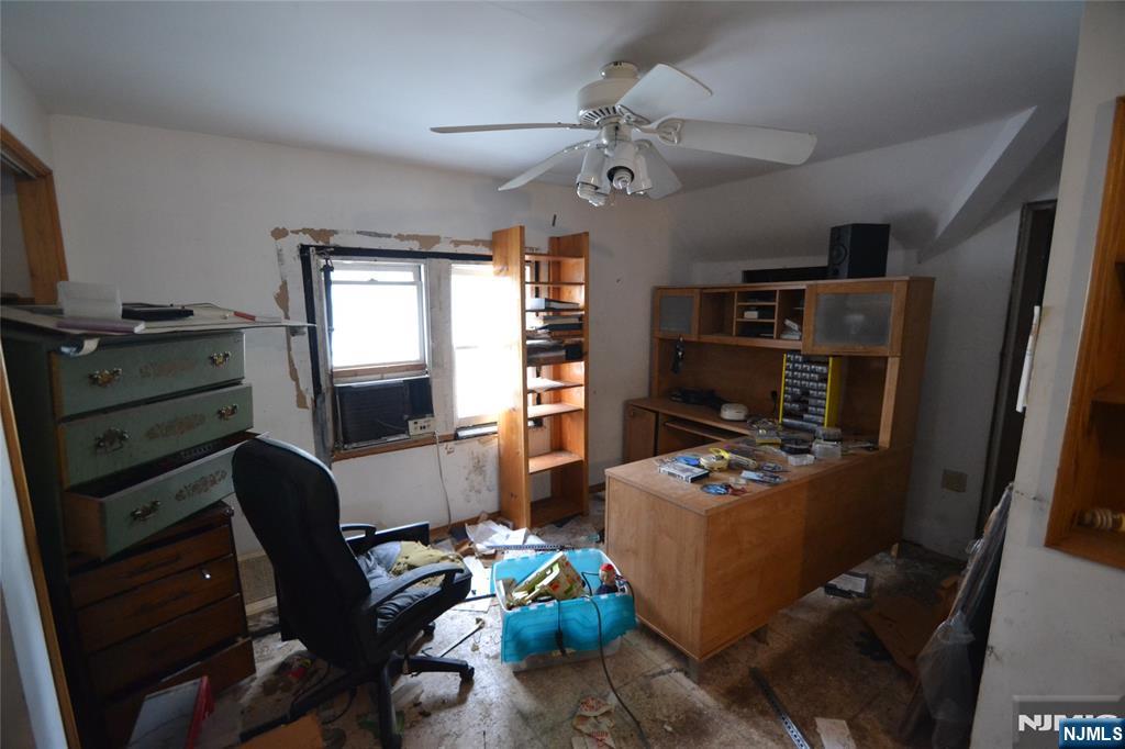 86 Montross Avenue Rutherford, NJ 07070 - Photo 22 of 23 a living room with furniture and a flat screen tv