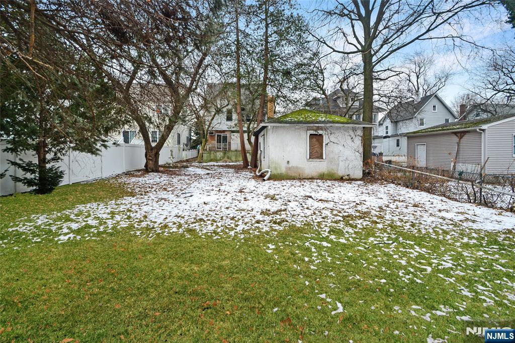 86 Montross Avenue Rutherford, NJ 07070 - Photo 4 of 23 a white house that has a tree in front of it