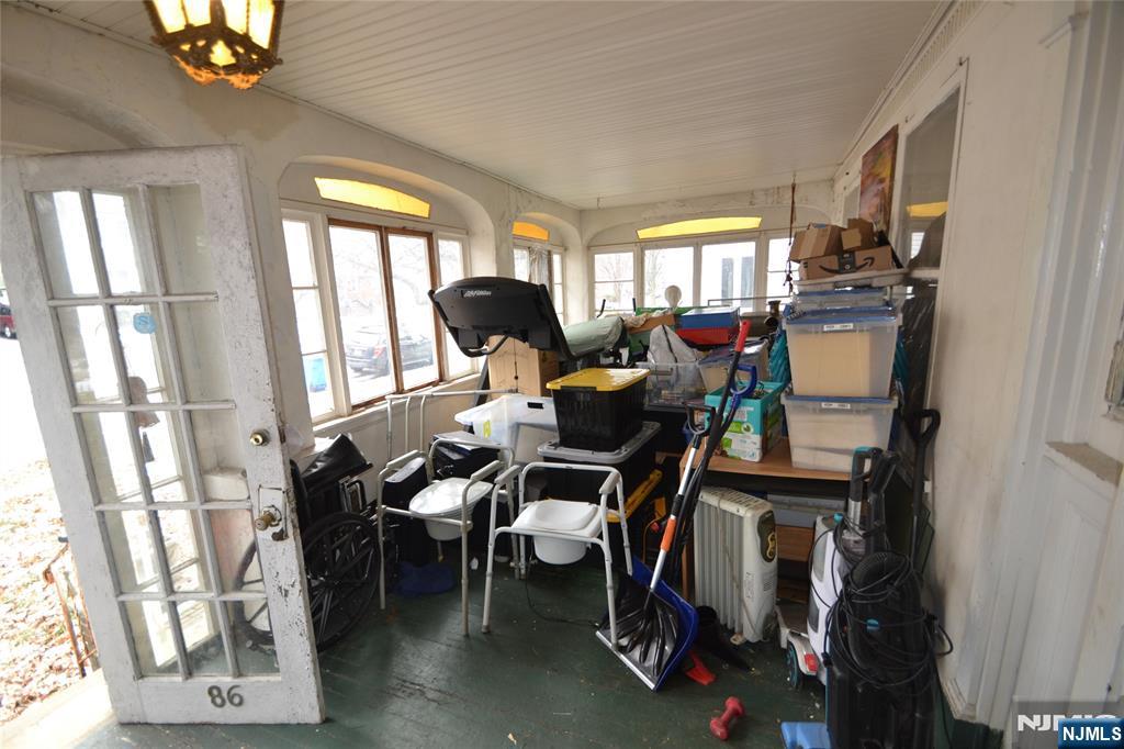 86 Montross Avenue Rutherford, NJ 07070 - Photo 5 of 23 a living room with furniture and a window
