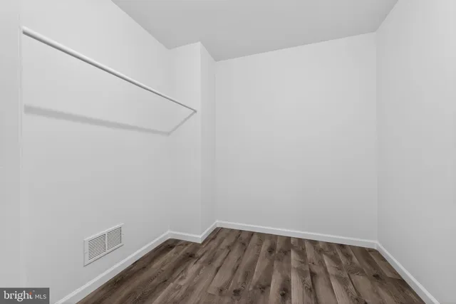 a view of small space with racks on the wall