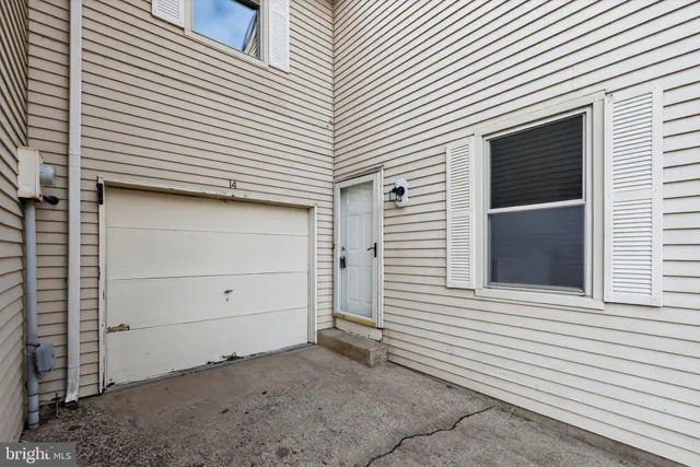 a view of a house with white door