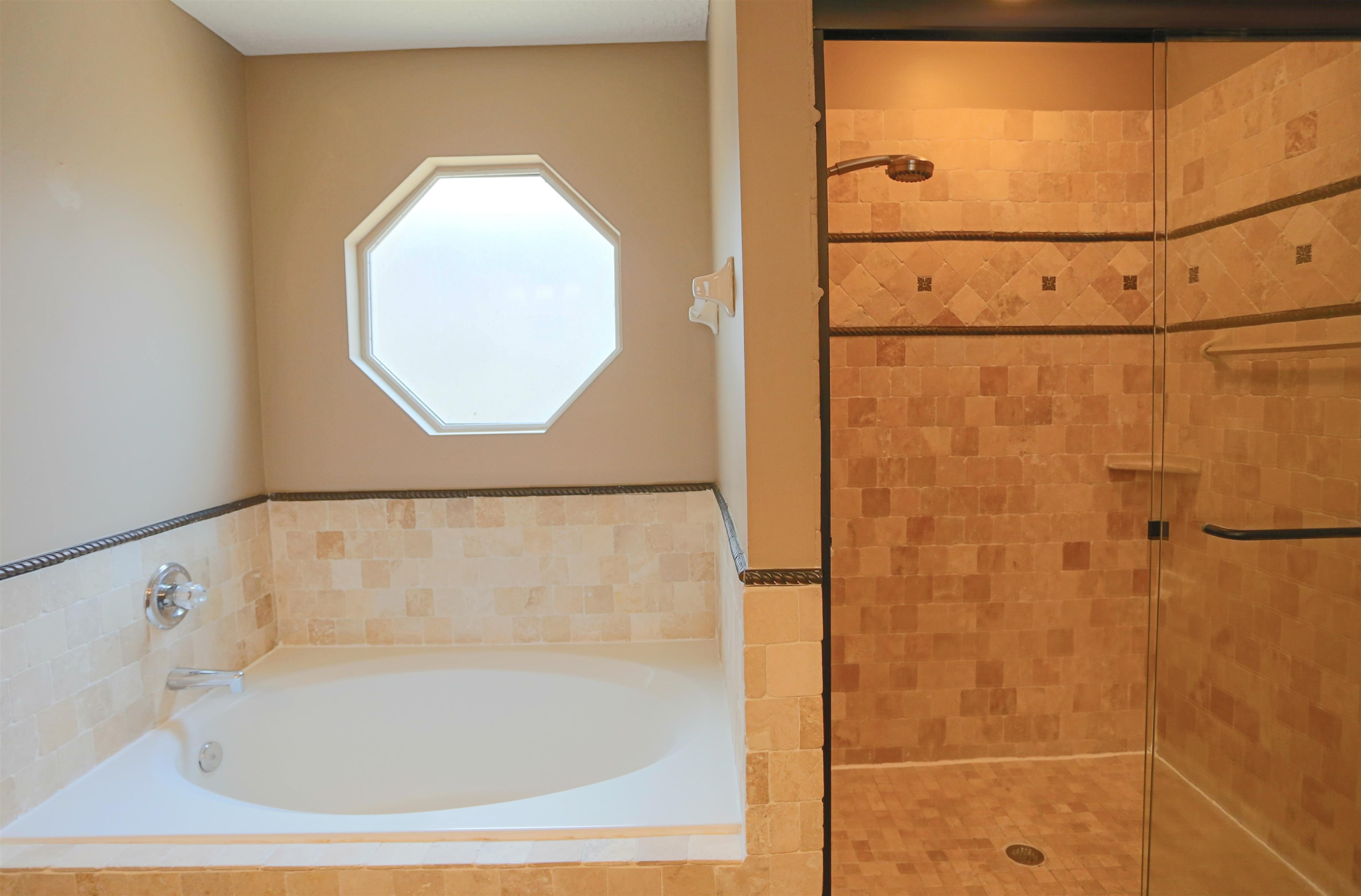 1768 Keswick Road St. Augustine, FL 32084 - Photo 18 of 30 a bathroom with a bathtub and a shower