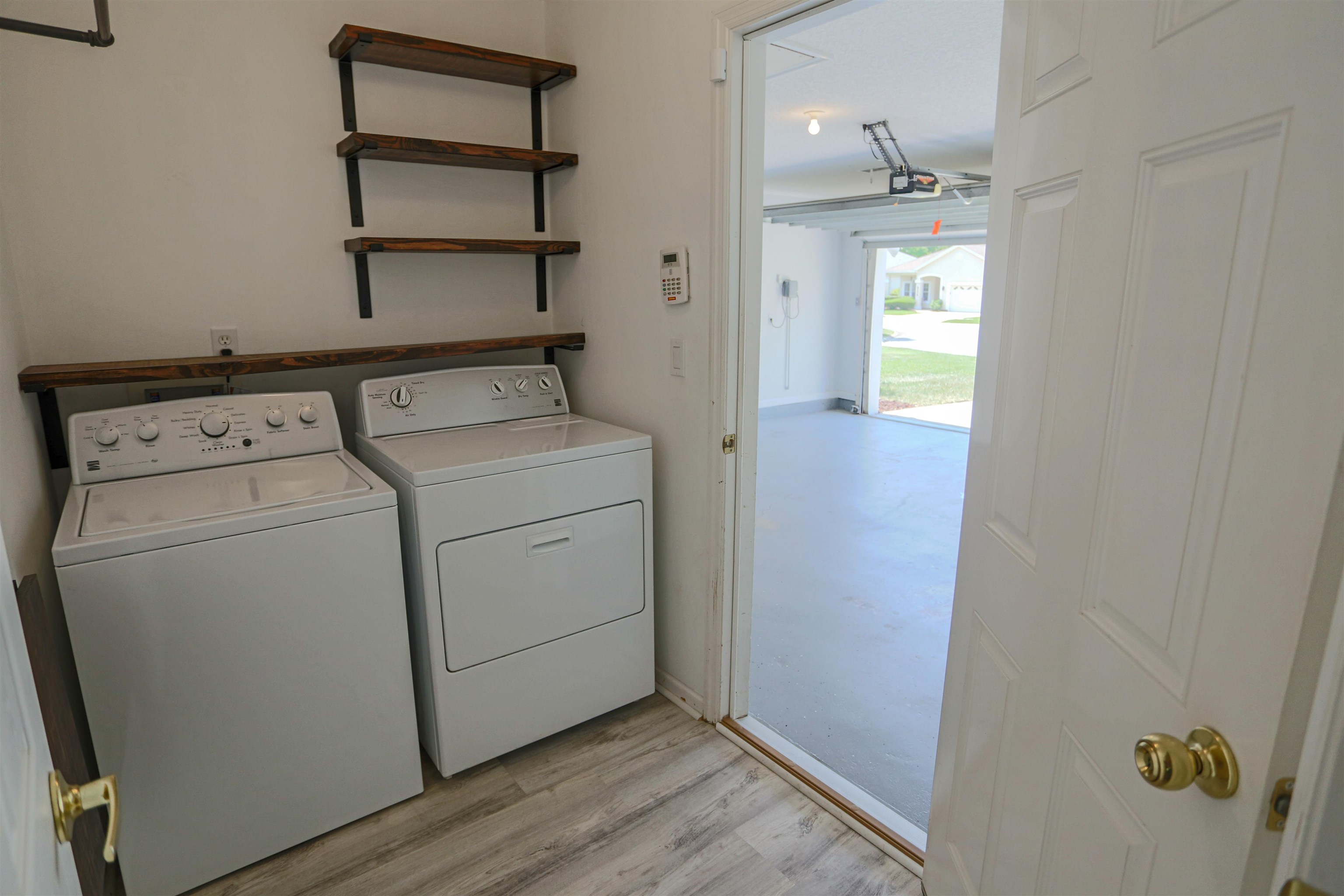 1768 Keswick Road St. Augustine, FL 32084 - Photo 25 of 30 a view of storage and utility room with washer and dryer