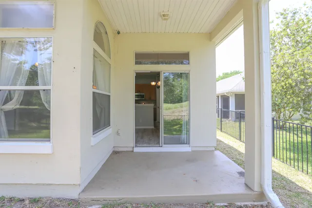a backyard of a house with lots of green space
